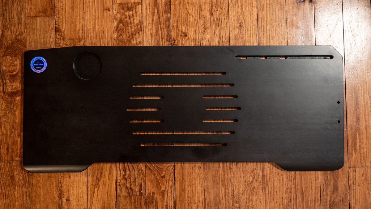 The wooden desk top of the Couchmaster Cyboss couch desk