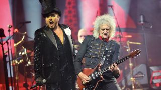 Adam Lambert performs on stage with Brian May of Queen at The O2 Arena on June 05, 2022