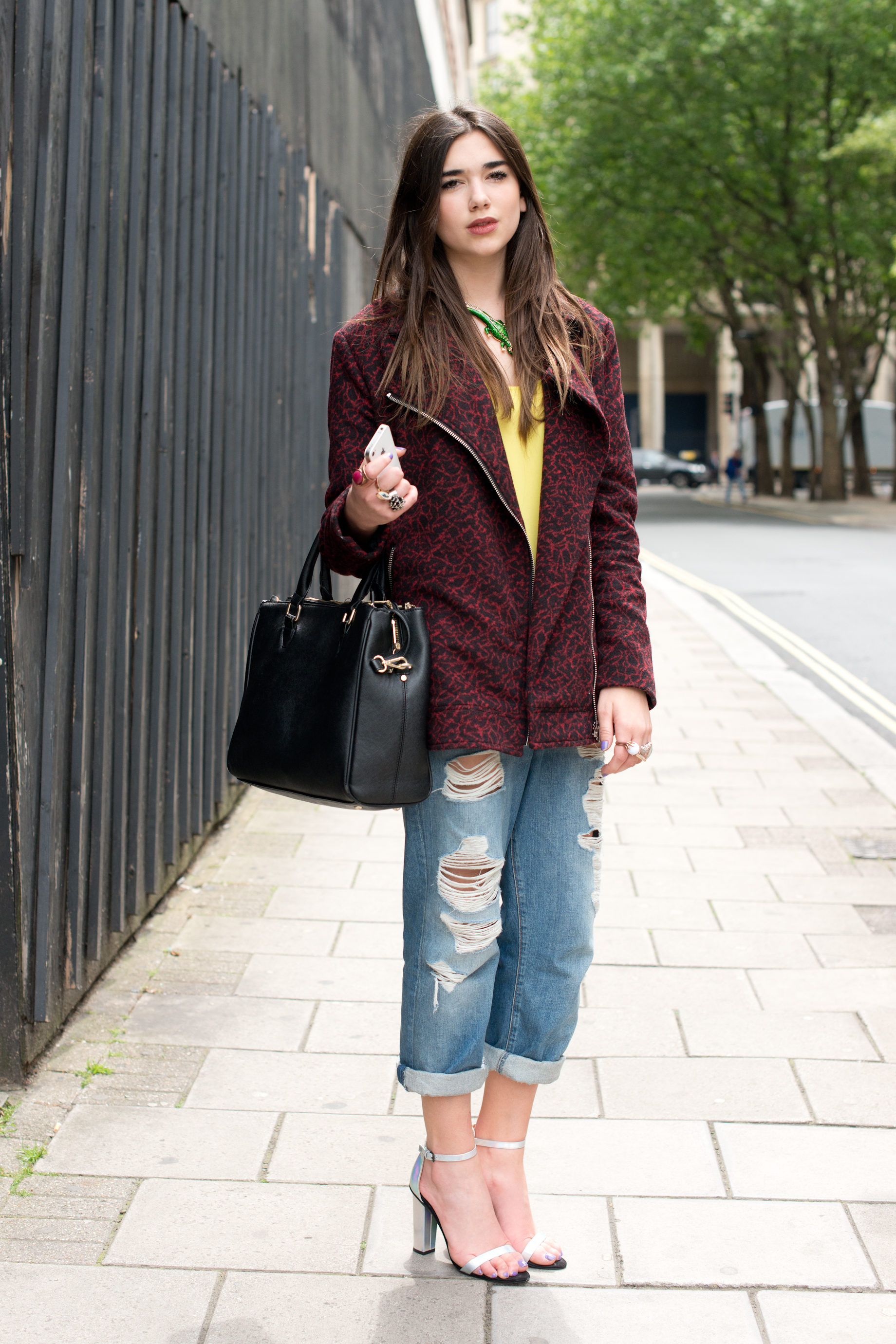 LONDON, ENGLAND - JUNE 17: Singer and Model Dua Lipa wears Zara shoes, Topshop Boutique jeans, Topshop Jacket and Top and a Zara bag on day 2 of London Collections: Men on June 17, 2013 in London, England. (Photo by Kirstin Sinclair/FilmMagic)
