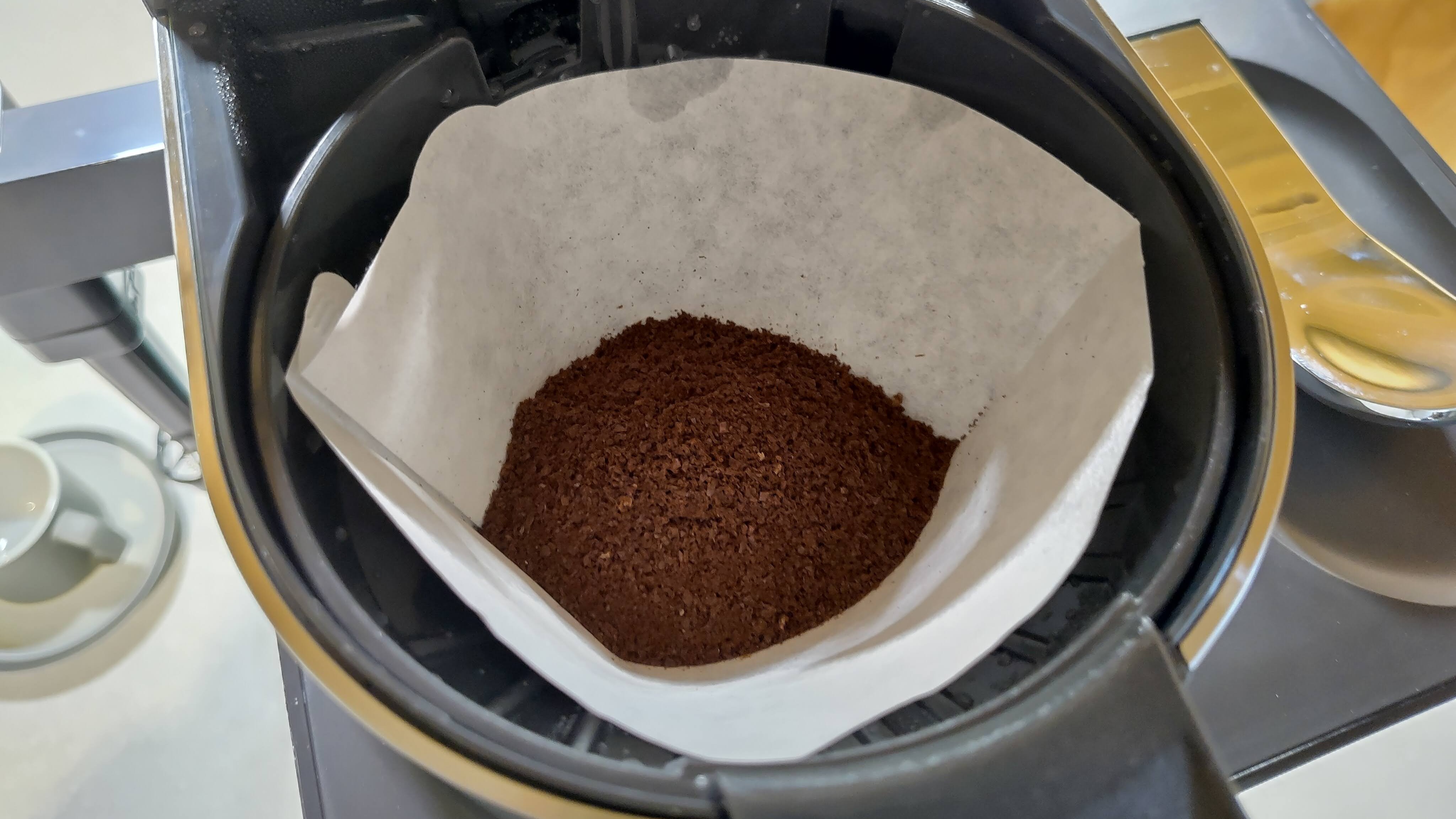 Ground coffee in Ninja Prestige Dual-Brew System filter basket