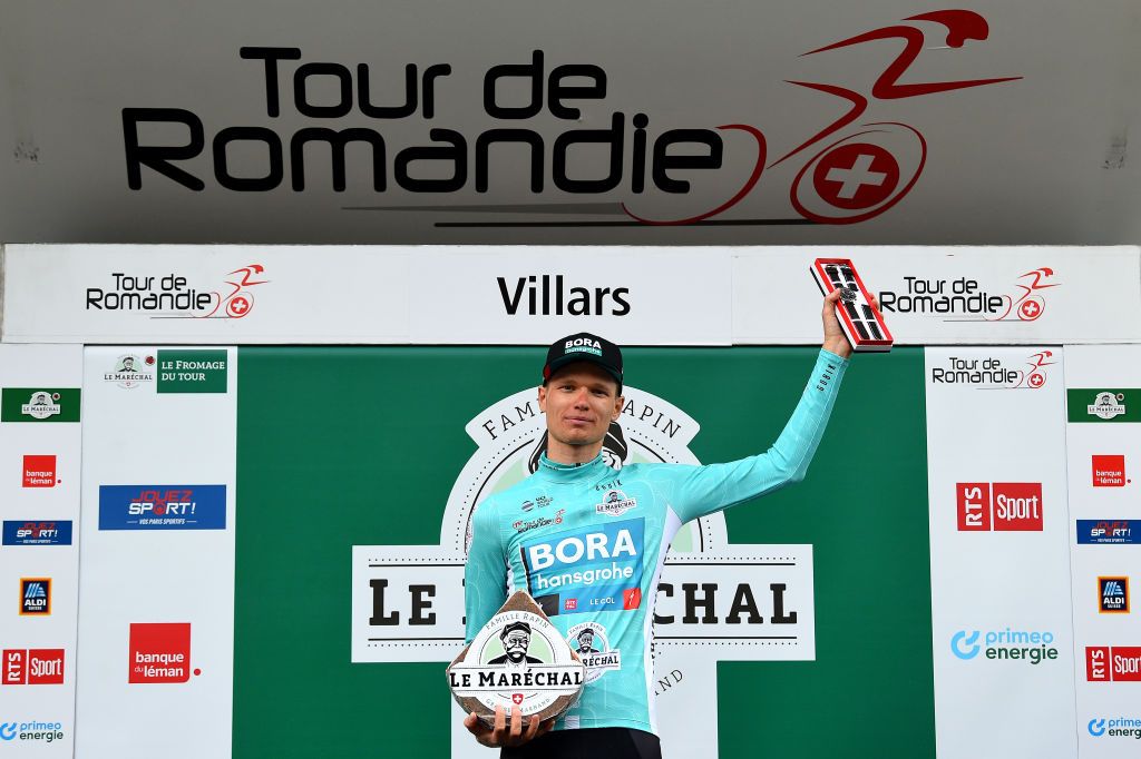 VILLARSSUROLLON SWITZERLAND MAY 01 Aleksander Vlasov of Russia and Bora Hansgrohe Team celebrates at podium as Turquoise Leader Jersey final winner during the 75th Tour De Romandie 2022 Stage 5 a 1584km Individual Time Trial stage from Aigle to VillarssurOllon 1256m ITT TDR2022 on May 01 2022 in VillarssurOllon Switzerland Photo by Dario BelingheriGetty Images