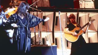 Ann (left) and Nancy Wilson of Heart perform onstage at the Universal Amphitheatre in Los Angeles, California on July 15, 1977