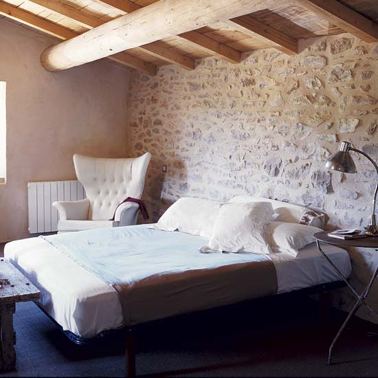 bedroom with chair and lamp