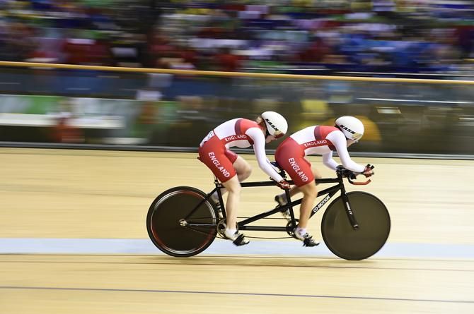 Sophie Thornhill and Helen Scott (England) ride to the gold medal