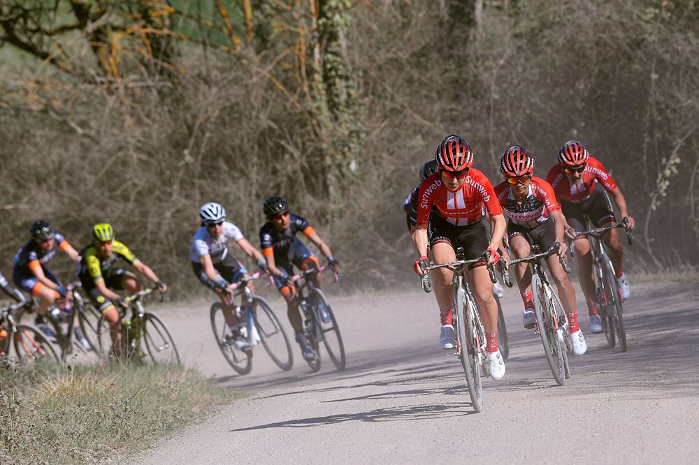 Sunweb lead the peloton through the gravel at Strade Bianche