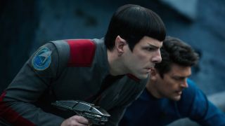 Zachary Quinto's Spock holding phaser in Star Trek Beyond