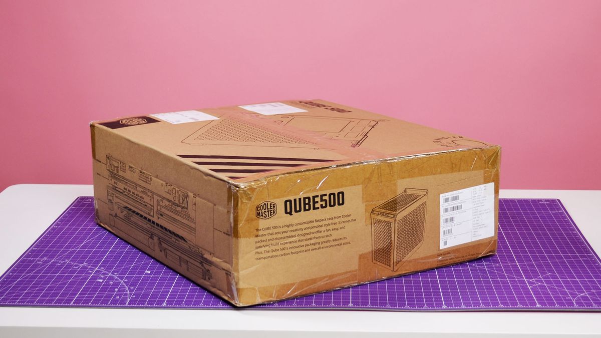 A Cooler Master Qube 500 PC case on a desk