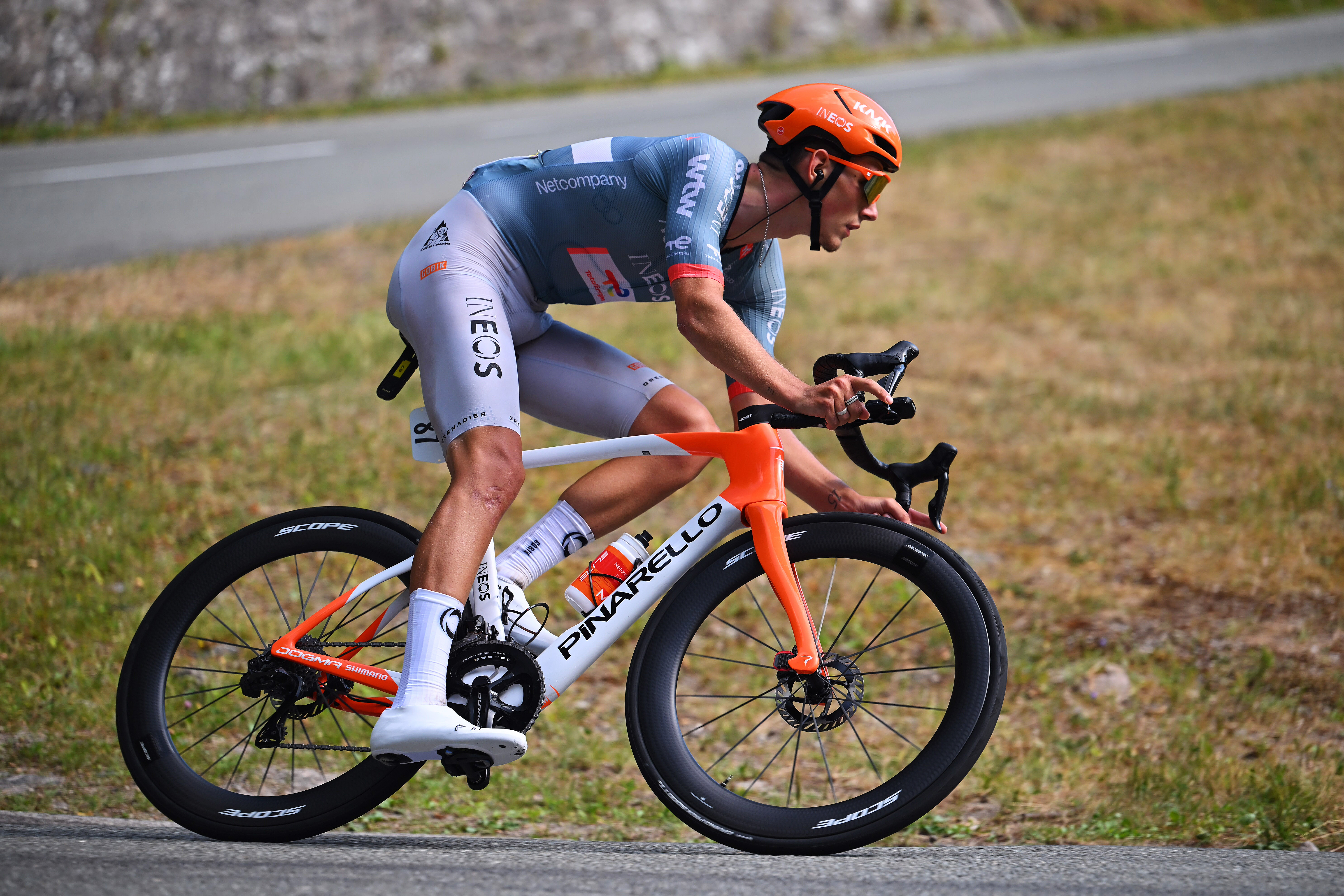 Josh Tarling descends at the Tour de France, riding for Netcompany-Ineos, on a Pinarello