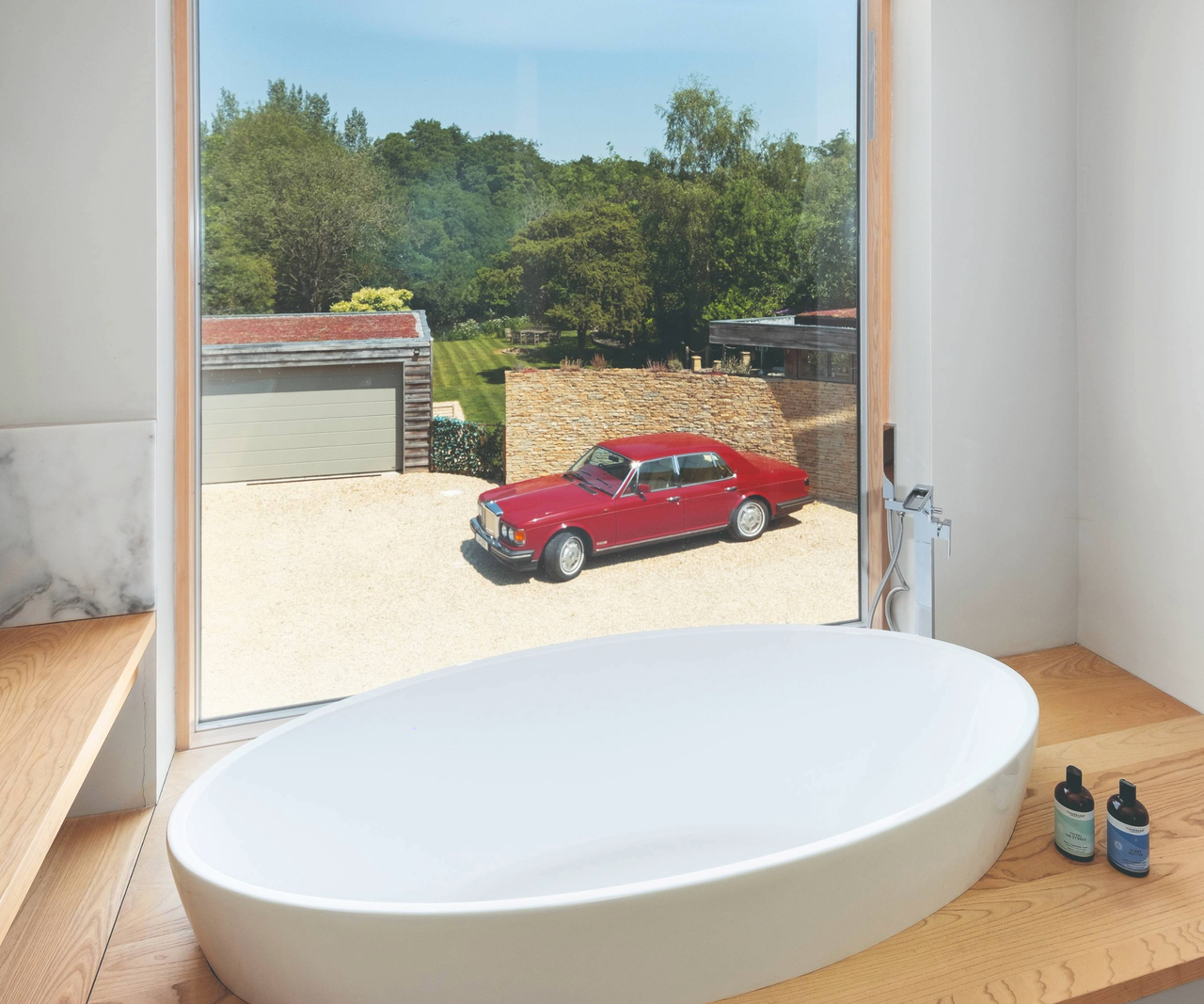 Bathtub overlooking window