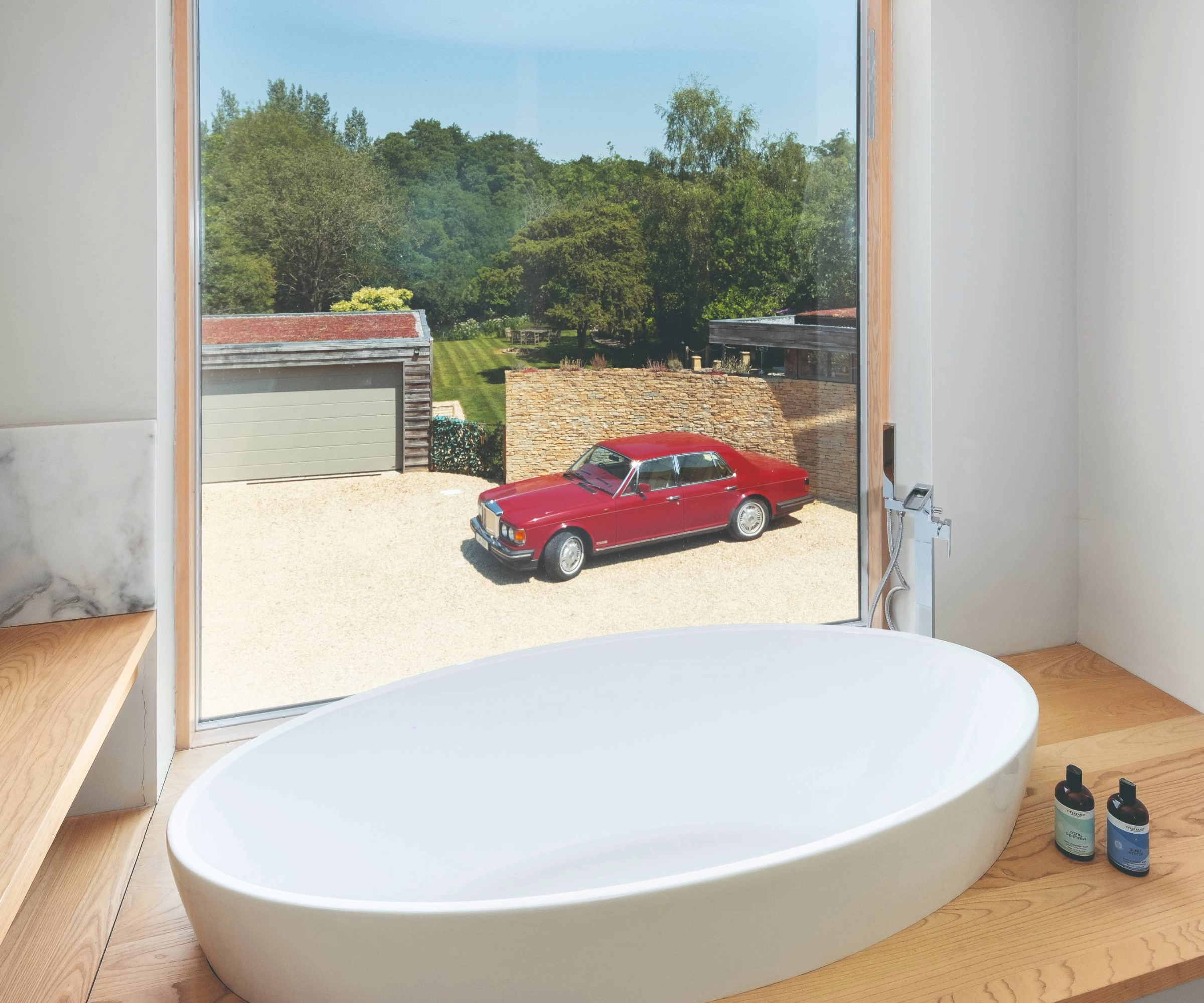 Bathtub overlooking window