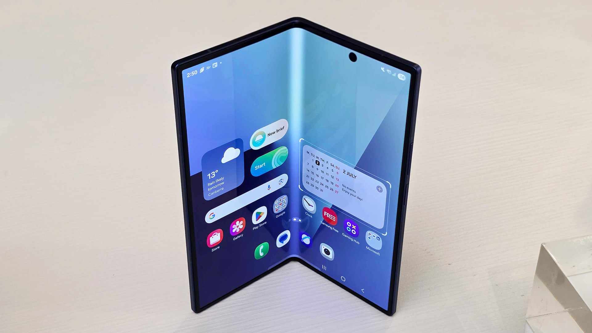 A semi-folded Samsung Galaxy Z Fold 7 displayed on a counter