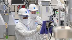 Intel engineers work in Fab 34, the newest Intel manufacturing facility in Ireland