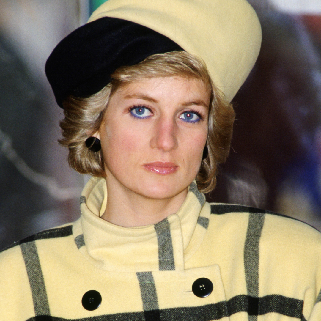 Princess Diana wears a yellow and black checked coat