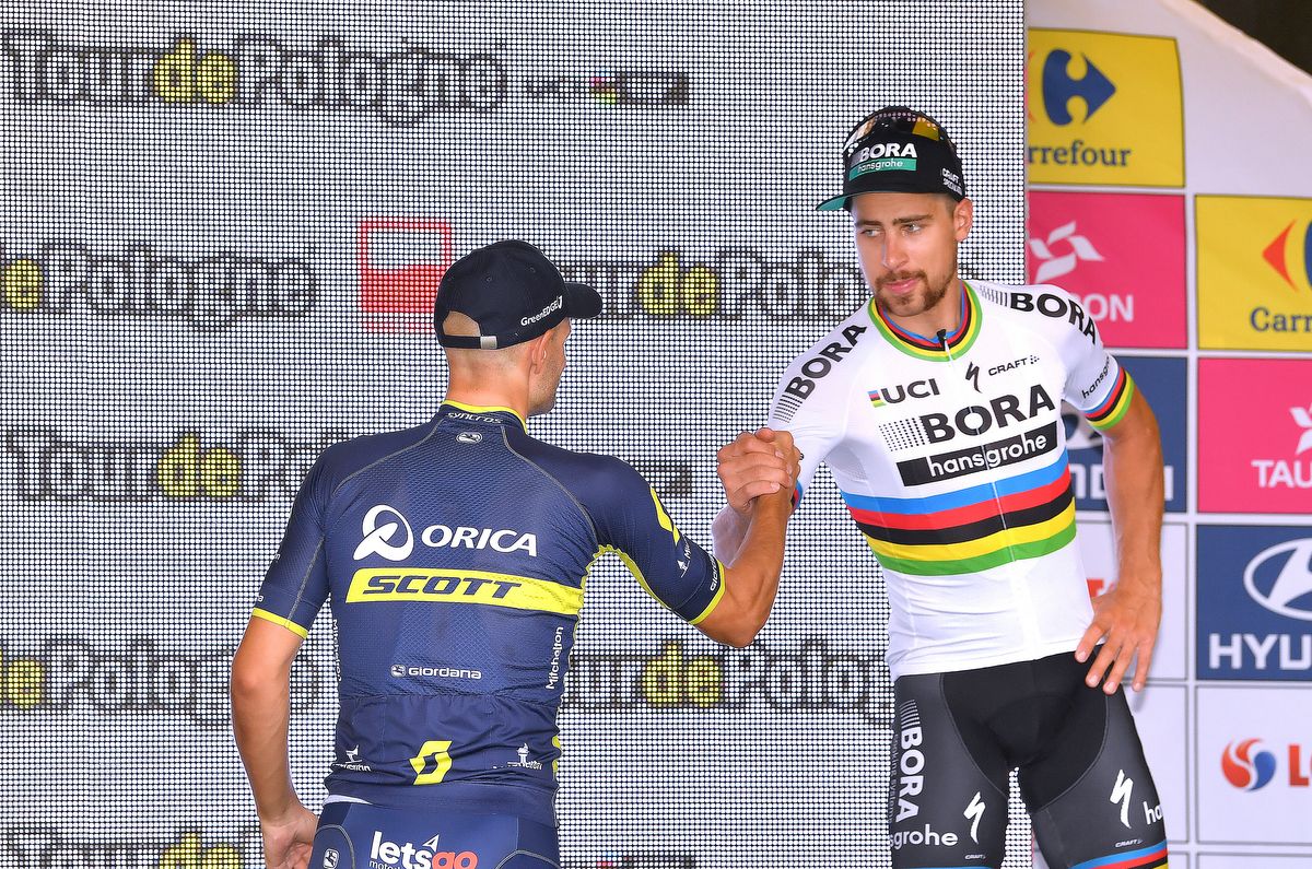 Luka Mezgec and Peter Sagan shake hands on the podium