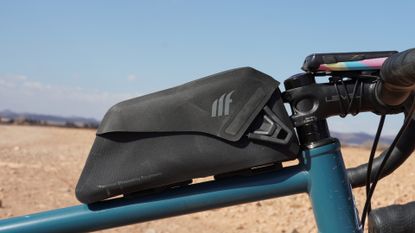 Tailfin Top Tube Pack mounted on a gravel bike