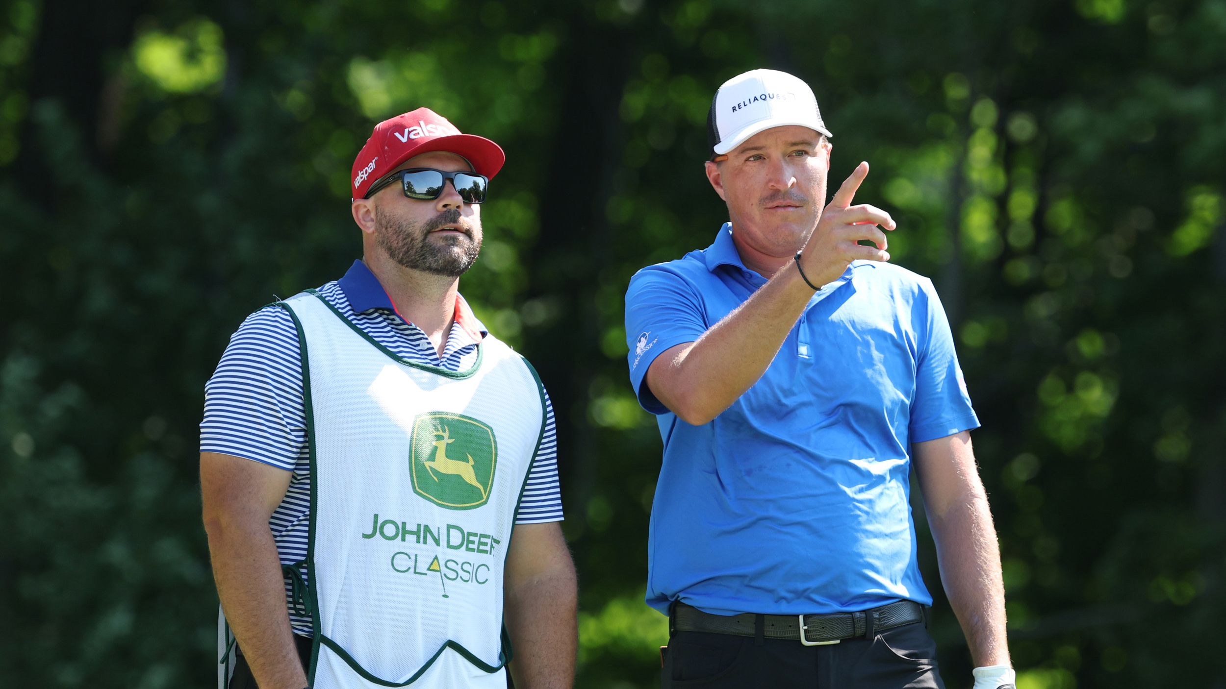 Kevin Roy and his caddie discuss an upcoming shot during round three of the 2025 John Deere Classic