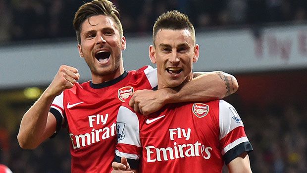 Arsenal players Laurent Koscielny with Olivier Giroud