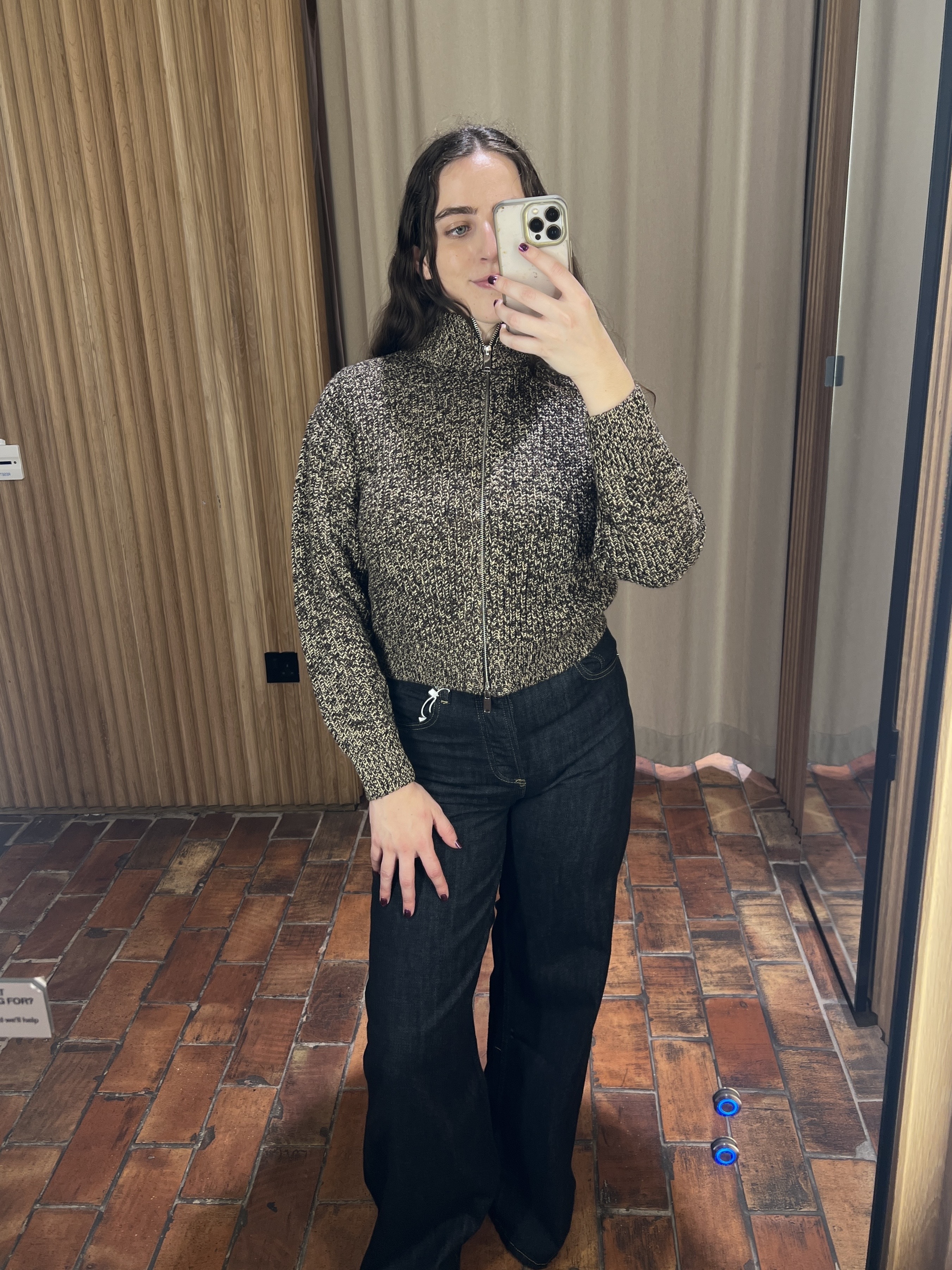 An image of Who What Wear&#039;s Ava Gilchrist wearing indigo jeans from Mango.