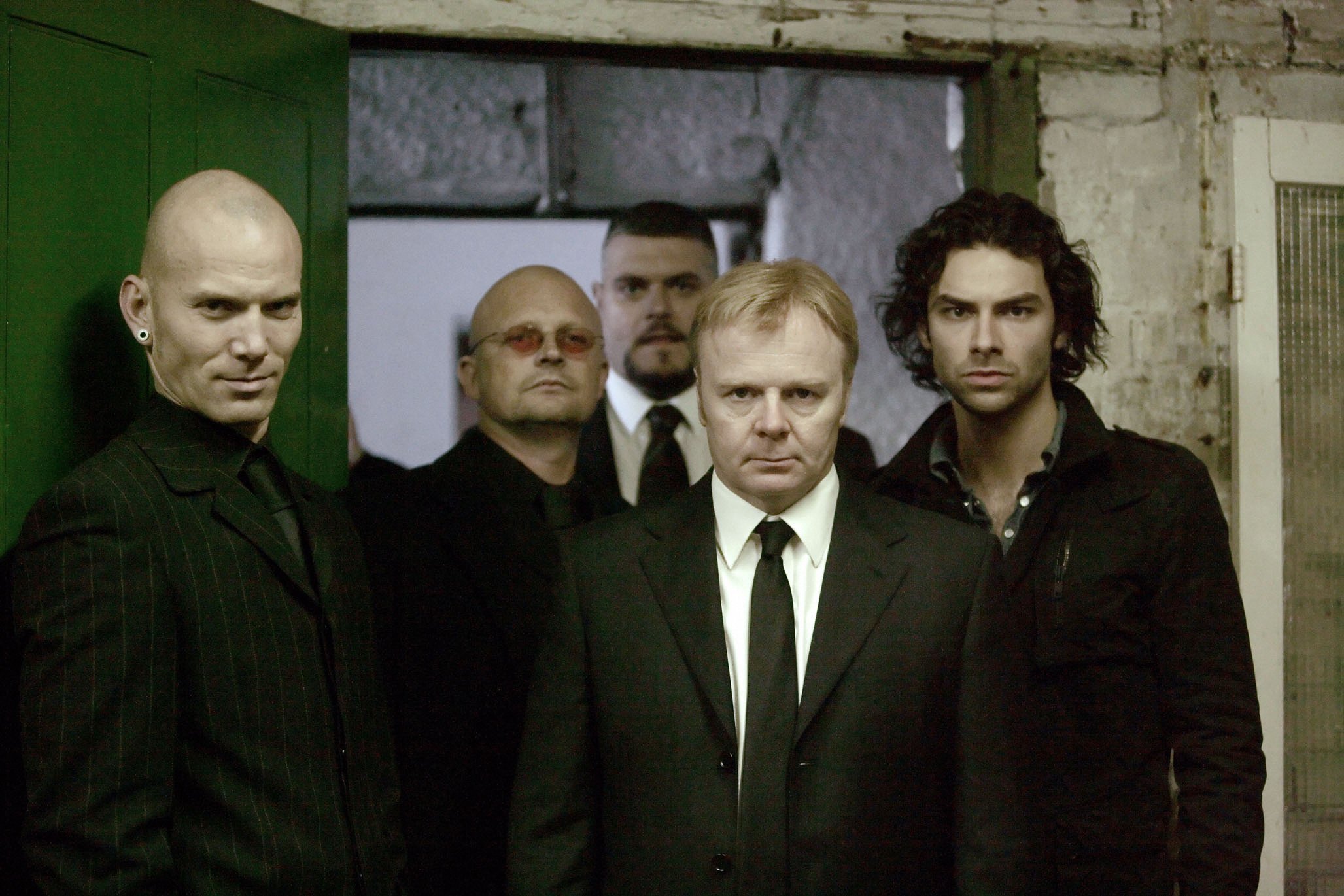 Jason as vampire Herrick standing with other Being Human cast.