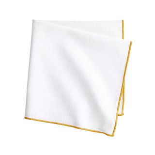 Cotton napkin with yellow seam