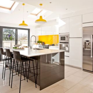 kitchen with hanging light and white worktop