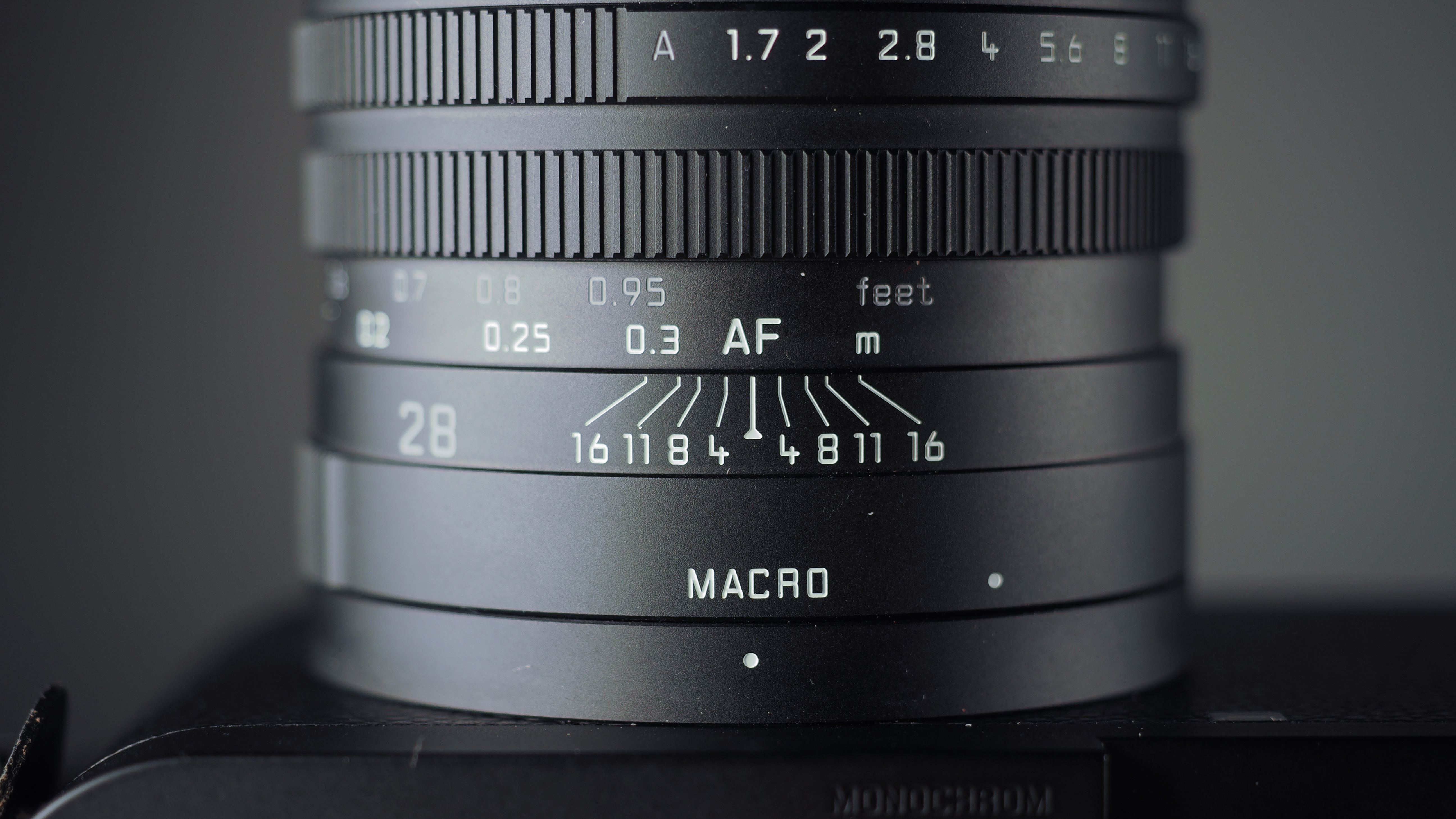 Leica Q3 Monochrom on a wooden surface