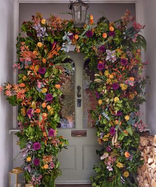 A large autumnal archway around a front door