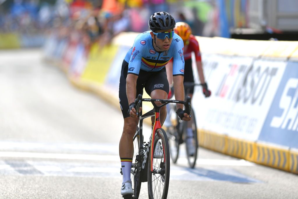 LEUVEN BELGIUM SEPTEMBER 26 Wout Van Aert of Belgium crosses the finishing line during the 94th UCI Road World Championships 2021 Men Elite Road Race a 2683km race from Antwerp to Leuven flanders2021 on September 26 2021 in Leuven Belgium Photo by Luc ClaessenGetty Images
