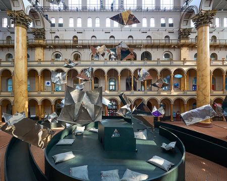 hanging reflective elements as part of Suchi Reddy installation at the National Building Museum