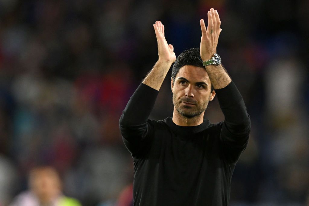 Arsenal manager Mikel Arteta applauds supporters on the pitch after the English Premier League football match between Crystal Palace and Arsenal at Selhurst Park in south London on August 5, 2022. - Arsenal won the game 2-0.