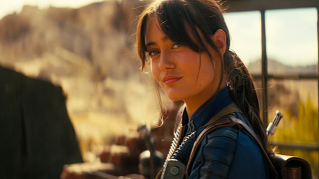 a girl in a blue jumpsuit in the wastelands