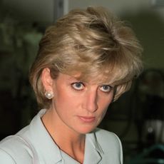 Princess Diana wearing a light blue suit