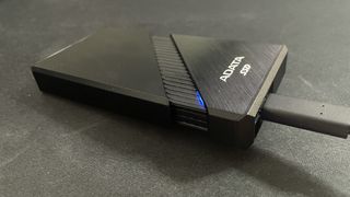 Adata SE920 external SSD turned on and plugged in