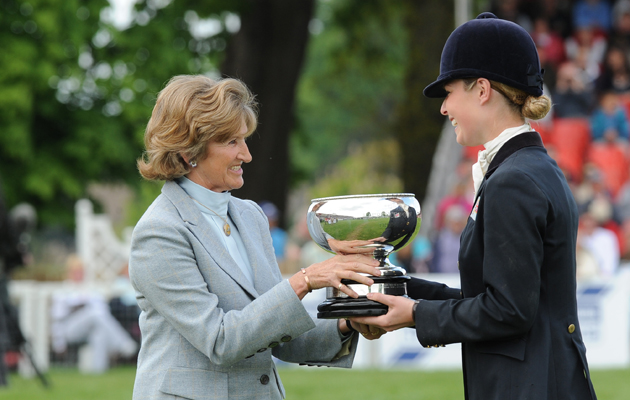 Emily Llewellyn receives the Laurence Rook Trophy from the Duchess of Beaufort in 2010