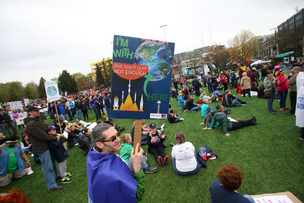 Brian Ehlert from Woodinville, Washington, joins others for a rally prior to the March for Science at Cal Anderson Park in Seattle, Washington, on April 22, 2017.