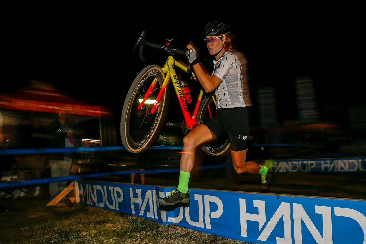 Maghalie Rochette (CX Fever) runs the barriers