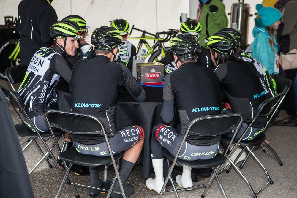 Axeon riders huddle for coffee before todays chilly stage