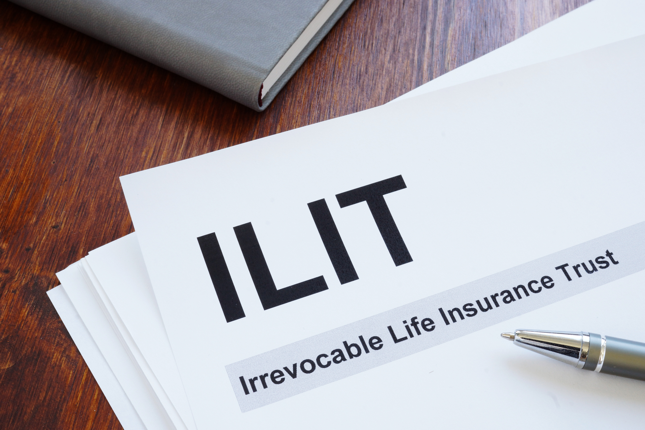 Conceptual photo showing printed text irrevocable life insurance trust (ILIT)