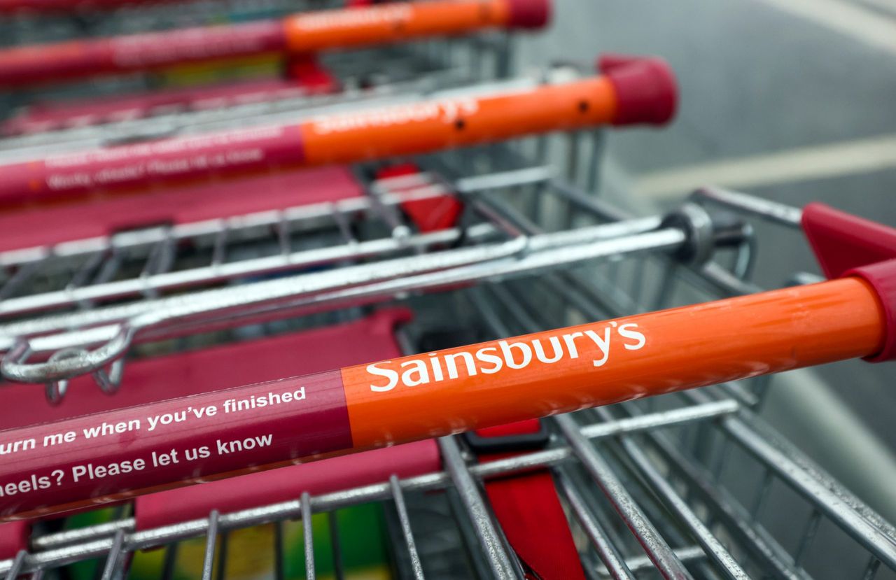 Shopping trolleys outside a J Sainsbury Plc supermarket in Chelmsford, U.K., on Tuesday, Jan. 11, 2022