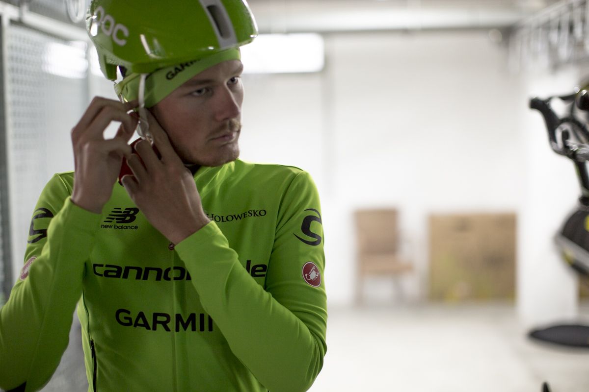 Dylan van Baarle straps on his helmet