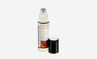 Roll-on Focus and Concentration oil by Anatomē against a light coloured background