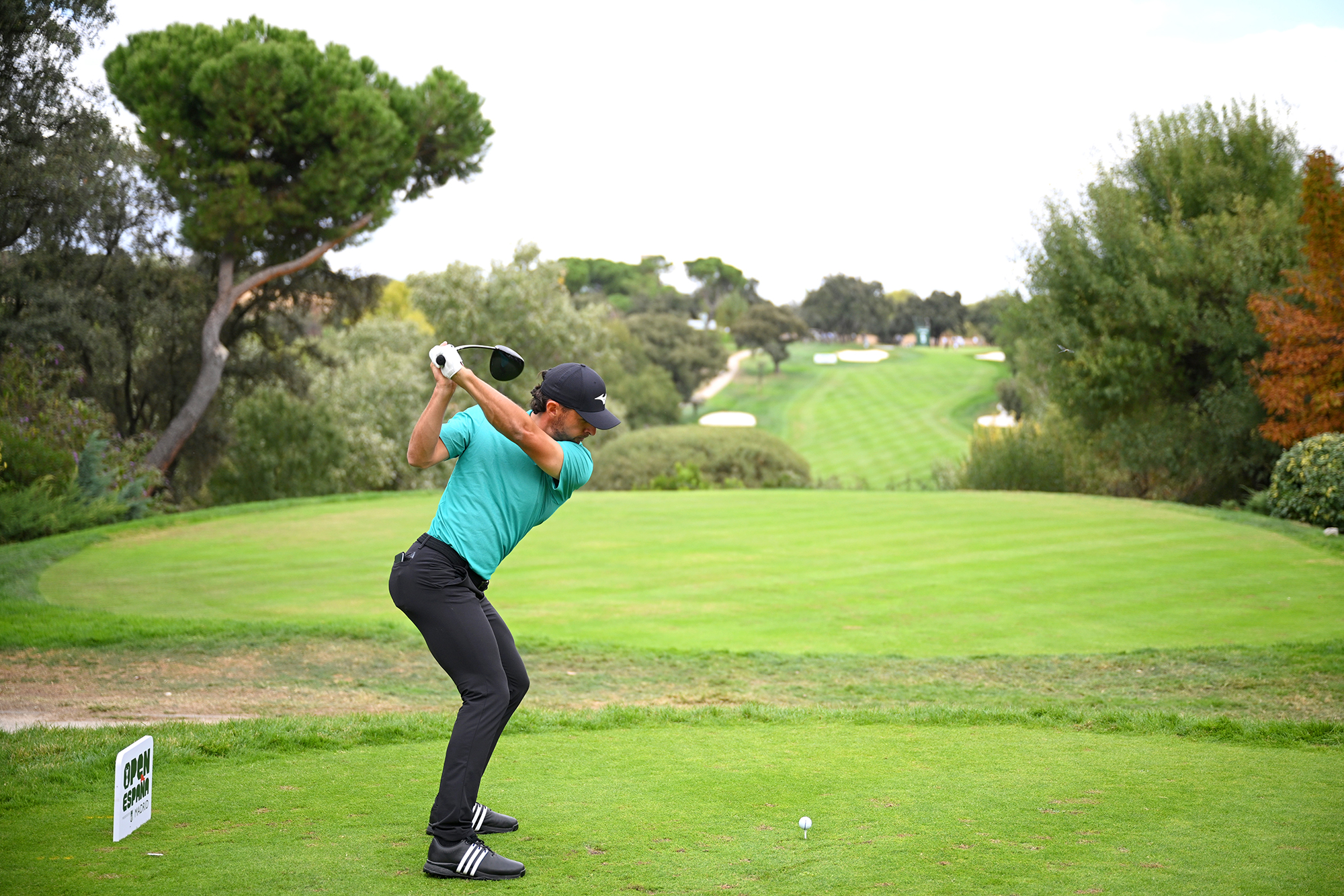 Marco Penge at the top of his backswing hitting a driver at the Open De Espana 2025