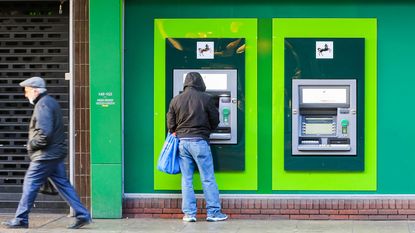 Man at a cashpoint