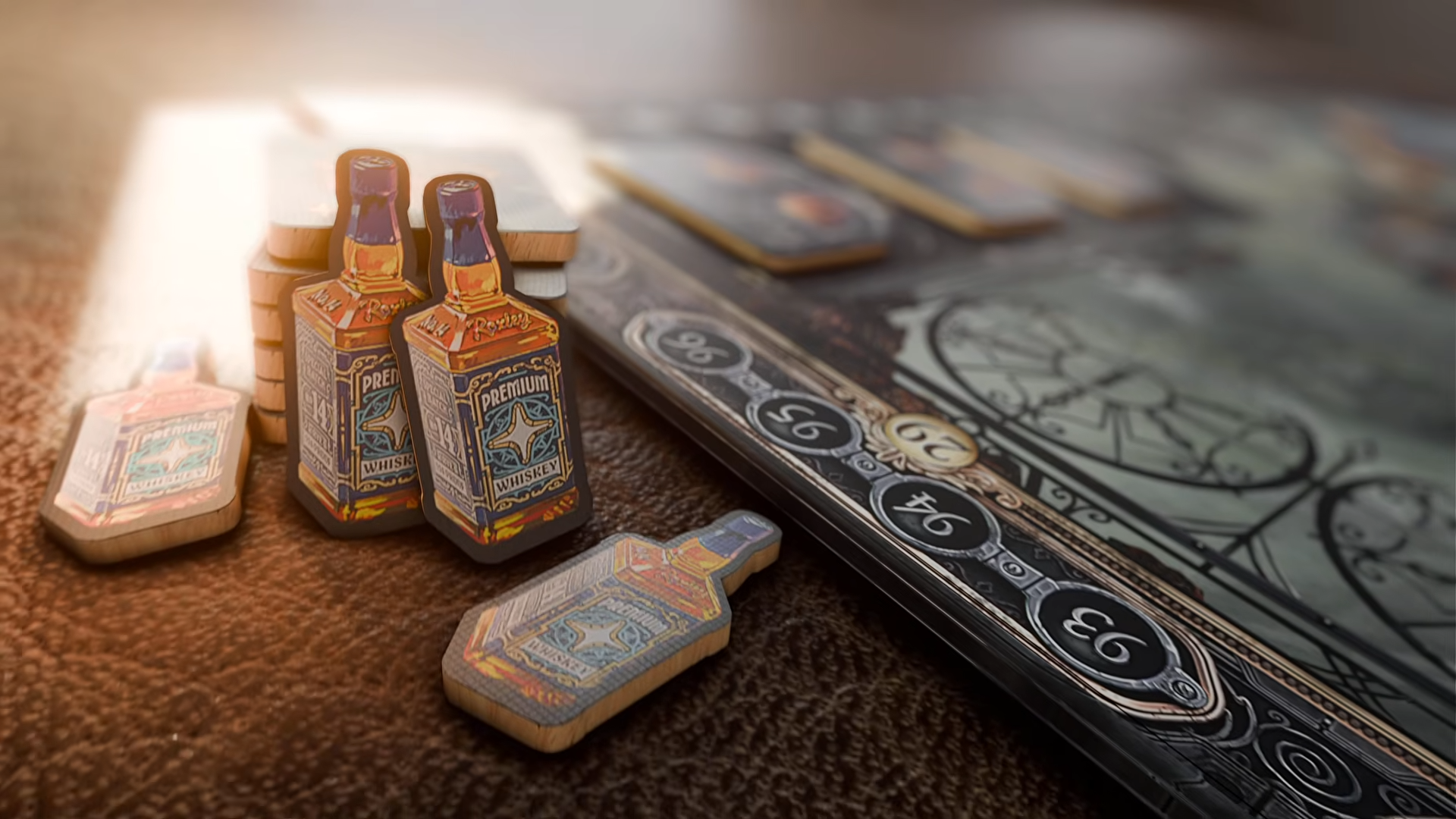 Icons for whiskey laid out beside a Brass: Pittsburgh board