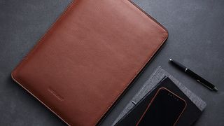 A folio MacBook Pro leather case from Woolnut. 