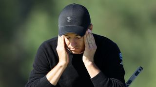 Jordan Spieth reacts on the 18th hole of his first round at The Masters