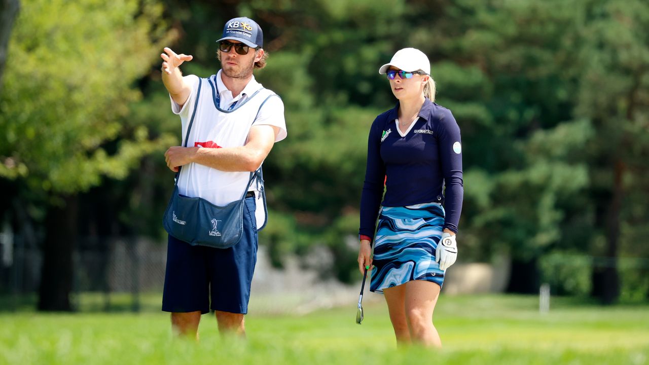 Jodi Ewart Shadoff and her caddie in conversation