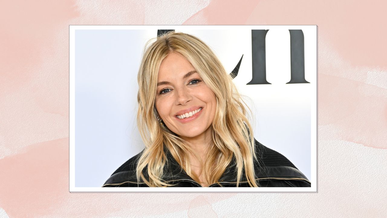 Image of Sienna Miller smiling, with curled blonde hair, on a pink watercolour background