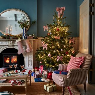 A Christmas-decorated living room with a Christmas tree
