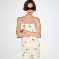 Reformation sale listing woman in floral dress